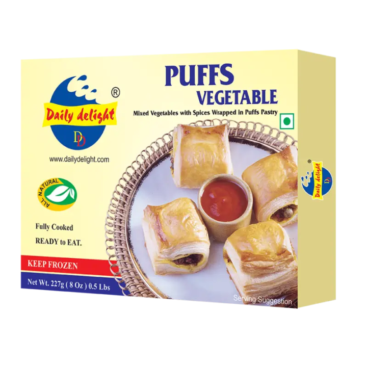 Daily Delight Vegetable Puffs. Crispy pastry with spicy veg filling. Perfect tea time snack.